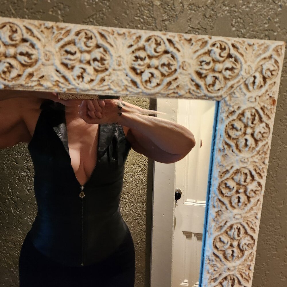 Highly detailed leather vest, fits like size 4